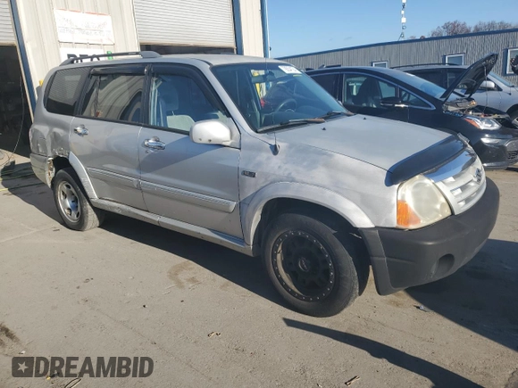 2005 Suzuki XL7 LX with VIN JS3TX92V054101305, listed as a Copart auction lot 79204124 with 149,589 mi miles and Salvage title. Bid and sale history available at DreamBid. Image 4.