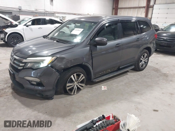 2016 Honda Pilot EX-L with VIN 5FNYF6H5XGB010230, listed as a IAAI auction lot 41858811 with 194,119 mi miles. Bid and sale history available at carsss.com. Image 17.