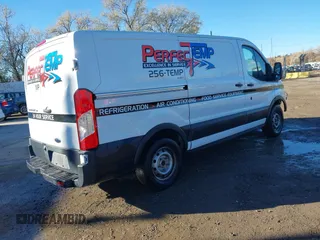 2019 Ford Transit with VIN 1FTYE1YM9KKB70785, listed as a IAAI auction lot 40818143 with 96,199 mi miles. Bid and sale history available at carsss.com. Image 4.