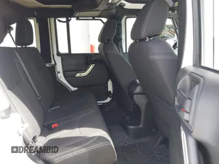 2017 Jeep Wrangler Unlimited Sahara with VIN 1C4BJWEG8HL734572, listed as a IAAI auction lot 41863636 with 123,979 mi miles. Bid and sale history available at carsss.com. Image 8.