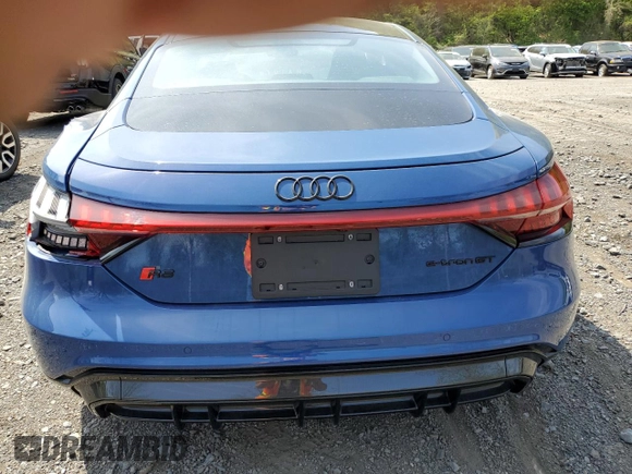 2023 Audi RS e-tron GT z VIN WAUBHBFW7P7903740, wystawiony jako Copart lot #55556935 z przebiegiem 8358 mil mil oraz Szkody całkowita. Historia ofert i sprzedaży dostępna na DreamBid. Obrazek 6.