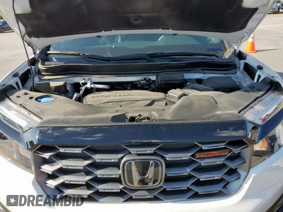 2023 Honda Passport TrailSport with VIN 5FNYF8H64PB007652, listed as a Copart auction lot 54064025 with 22,870 mi miles and Salvage title. Bid and sale history available at DreamBid. Image 12.