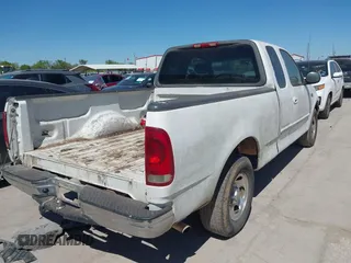 2002 Ford F-150 XL with VIN 1FTRX17232NA78925, listed as a IAAI auction lot 41851582 with 43 mi miles. Bid and sale history available at carsss.com. Image 4.