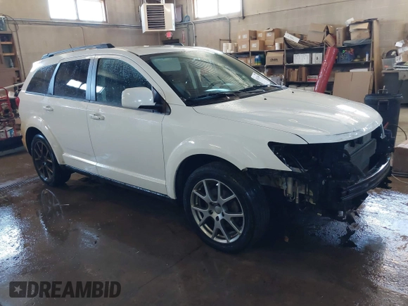 2015 Dodge Journey R/T with VIN 3C4PDDEGXFT574696, listed as a IAAI auction lot 41542460 with 153,044 mi miles and . Bid and sale history available at DreamBid. Image 1.
