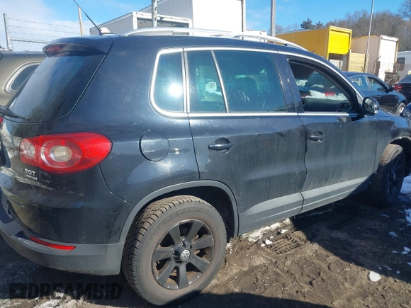 2011 Volkswagen Tiguan SE with VIN WVGBV7AXXBW511550, listed as a IAAI auction lot 41630804 with 99,967 mi miles and . Bid and sale history available at DreamBid. Image 13.