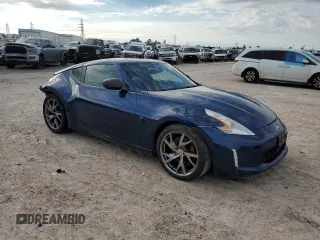 2013 Nissan 370Z with VIN JN1AZ4EH6DM880252, listed as a Copart auction lot 70528464 with 63,111 mi miles and Salvage Title. Bid and sale history available at carsss.com. Image 4.