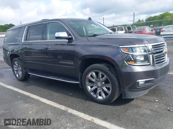 2015 Chevrolet Suburban LTZ with VIN 1GNSKKKC4FR589913, listed as a IAAI auction lot 42017190 with 216,145 mi miles. Bid and sale history available at carsss.com. Image 1.