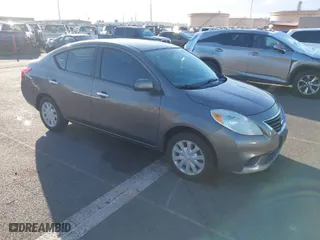 2012 Nissan Versa SL with VIN 3N1CN7AP2CL813868, listed as a IAAI auction lot 41512718 with 88,318 mi miles. Bid and sale history available at carsss.com. Image 1.