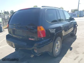 2004 GMC Envoy SLE with VIN 1GKDS13S942294303, listed as a IAAI auction lot 41992547 with 196,444 mi miles. Bid and sale history available at carsss.com. Image 4.