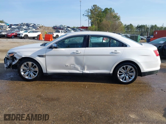 2012 Ford Taurus Limited z VIN 1FAHP2FW1CG103595, wystawiony jako IAAI lot #41913906 z przebiegiem 308 496 mil mil oraz . Historia ofert i sprzedaży dostępna na DreamBid. Obrazek 14.