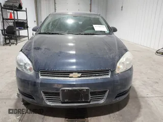 2011 Chevrolet Impala Police Police with VIN 2G1WD5EM2B1165829, listed as a IAAI auction lot 41380558 with 110,695 mi miles. Bid and sale history available at carsss.com. Image 12.
