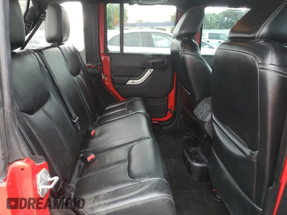 2014 Jeep Wrangler Unlimited Rubicon with VIN 1C4BJWFG1EL232836, listed as a Copart auction lot 82529654 with 106,193 mi miles and Clean Title. Bid and sale history available at carsss.com. Image 11.