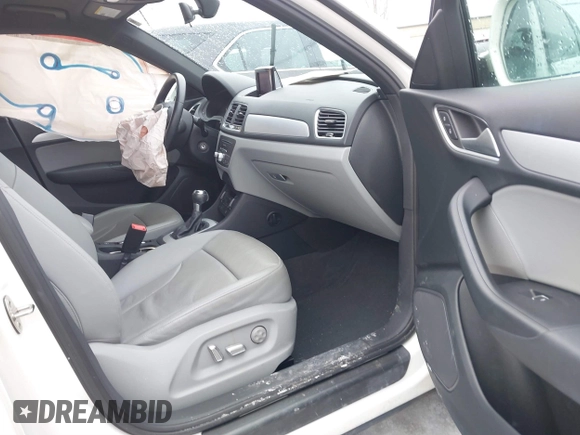 2017 Audi Q3 Premium z VIN WA1BCCFS4HR016424, wystawiony jako IAAI lot #41627278 z przebiegiem 60 028 mil mil oraz . Historia ofert i sprzedaży dostępna na DreamBid. Obrazek 5.