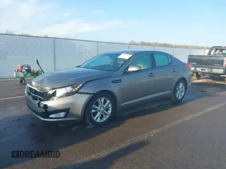 2013 Kia Optima EX with VIN 5XXGN4A77DG101902, listed as a IAAI auction lot 42001996 with 143,469 mi miles and . Bid and sale history available at DreamBid. Image 2.