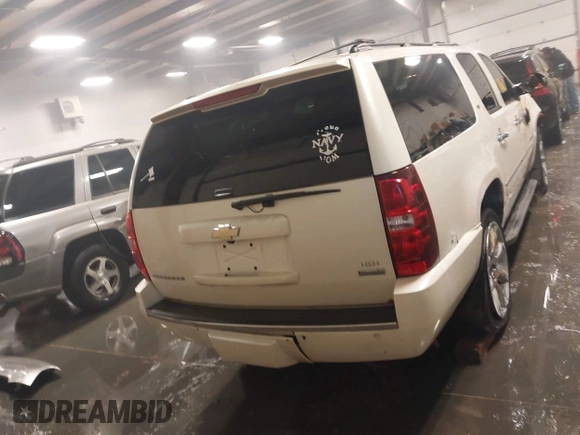 2010 Chevrolet Suburban LTZ with VIN 1GNUKKE32AR271253, listed as a IAAI auction lot 41161374 with 164,184 mi miles. Bid and sale history available at carsss.com. Image 16.