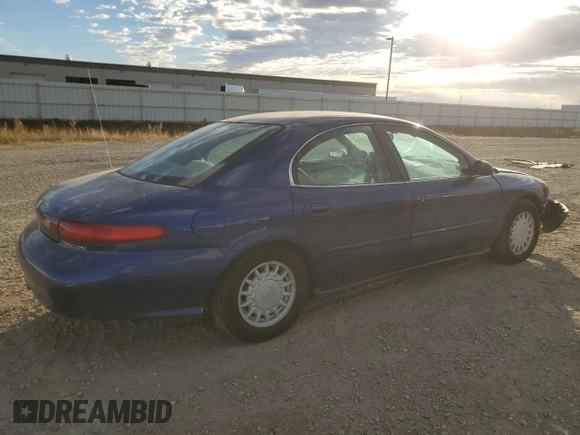 1996 Mercury Sable GS z VIN 1MELM50U3TA659219, wystawiony jako Copart lot #74373944 z przebiegiem 156 398 mil mil oraz Szkody całkowita. Historia ofert i sprzedaży dostępna na DreamBid. Obrazek 3.