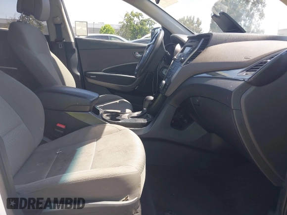 2016 Hyundai Santa Fe z VIN 5XYZT3LB9GG322900, wystawiony jako IAAI lot #42417788 z przebiegiem 160 621 mil mil oraz . Historia ofert i sprzedaży dostępna na DreamBid. Obrazek 5.