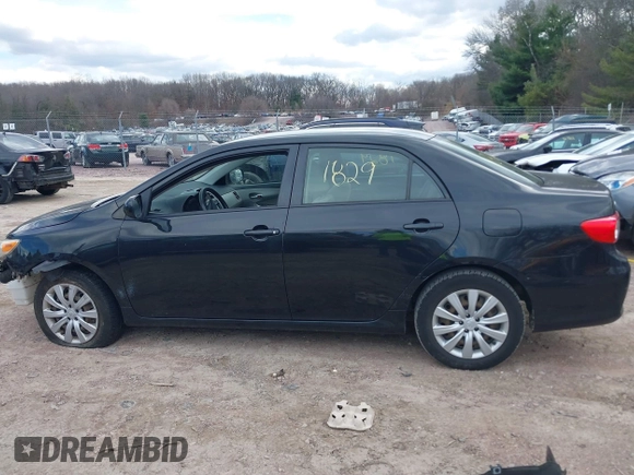 2012 Toyota Corolla L with VIN JTDBU4EE8C9180465, listed as a IAAI auction lot 41861829 with 163,631 mi miles. Bid and sale history available at carsss.com. Image 14.