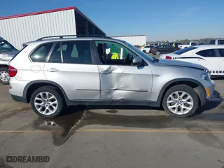 2011 BMW X5 35i with VIN 5UXZV4C5XBL412661, listed as a IAAI auction lot 41810470 with 168,470 mi miles. Bid and sale history available at carsss.com. Image 12.