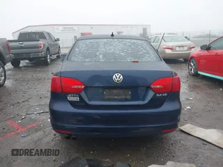 2013 Volkswagen Jetta SE z VIN 3VWDX7AJ3DM267839, wystawiony jako IAAI lot #41157583 z przebiegiem 61 643 mil mil oraz . Historia ofert i sprzedaży dostępna na DreamBid. Obrazek 17.