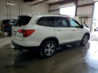 2018 Honda Pilot EX-L with VIN 5FNYF6H58JB040611, listed as a Copart auction lot 63614525 with 148,656 mi miles and Salvage title. Bid and sale history available at DreamBid. Image 3.