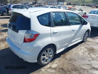 2009 Honda Fit Sport w/Navi with VIN JHMGE88679S067041, listed as a IAAI auction lot 41877402 with 162,485 mi miles. Bid and sale history available at carsss.com. Image 4.