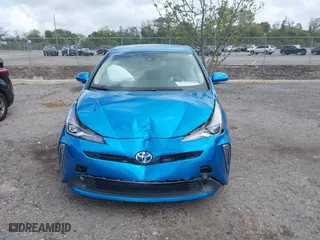 2022 Toyota Prius L Eco with VIN JTDKAMFU5N3165006, listed as a IAAI auction lot 41753470 with 33,567 mi miles. Bid and sale history available at carsss.com. Image 12.