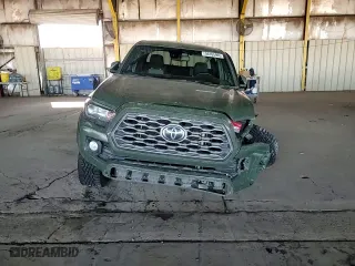 2022 Toyota Tacoma 4WD SR with VIN 3TYCZ5AN0NT055986, listed as a Copart auction lot 50165995 with 52,628 mi miles and Salvage Title. Bid and sale history available at carsss.com. Image 11.