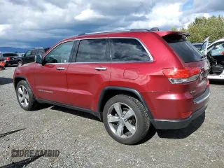 2014 Jeep Grand Cherokee Limited z VIN 1C4RJFBGXEC101022, wystawiony jako Copart lot #57526125 z przebiegiem 124 463 mil mil oraz Szkoda całkowita • Salvage title. Historia ofert i sprzedaży dostępna na DreamBid. Obrazek 2.