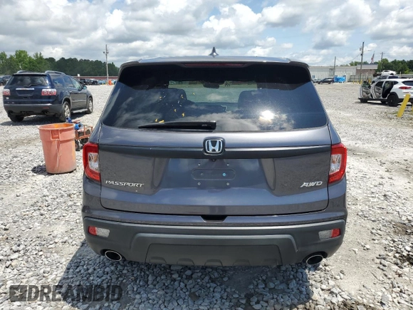 2021 Honda Passport EX-L with VIN 5FNYF8H54MB002017, listed as a Copart auction lot 59850975 with 54,275 mi miles and Salvage title. Bid and sale history available at DreamBid. Image 6.