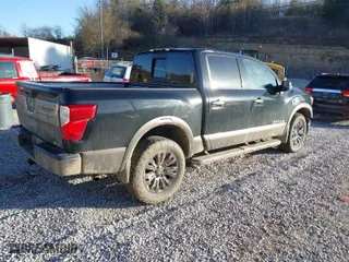 2017 Nissan Titan SV with VIN 1N6AA1E57HN516363, listed as a IAAI auction lot 41780611 with 114,749 mi miles. Bid and sale history available at carsss.com. Image 4.