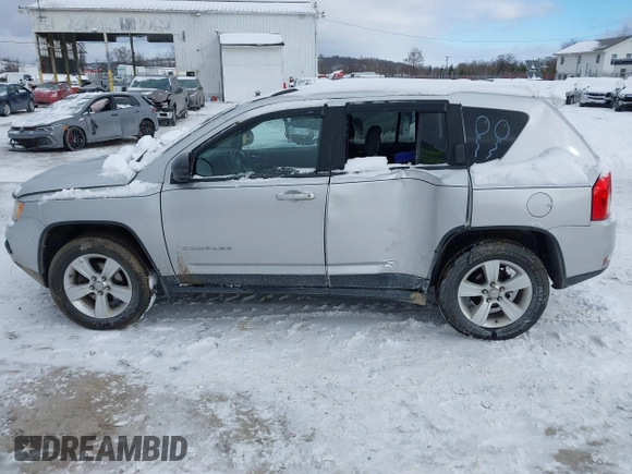 2013 Jeep Compass Sport with VIN 1C4NJDBB1DD113866, listed as a IAAI auction lot 41246375 with 204,405 mi miles. Bid and sale history available at carsss.com. Image 6.