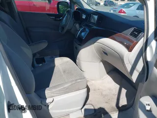 2014 Nissan Quest S with VIN JN8AE2KP7E9107596, listed as a IAAI auction lot 42745979 with 180,780 mi miles and . Bid and sale history available at DreamBid. Image 5.