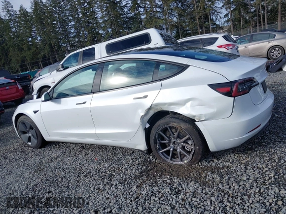 2021 Tesla Model 3 Standard Range Plus z VIN 5YJ3E1EAXMF871730, wystawiony jako IAAI lot #41794274 z przebiegiem 18 791 mil mil oraz . Historia ofert i sprzedaży dostępna na DreamBid. Obrazek 14.
