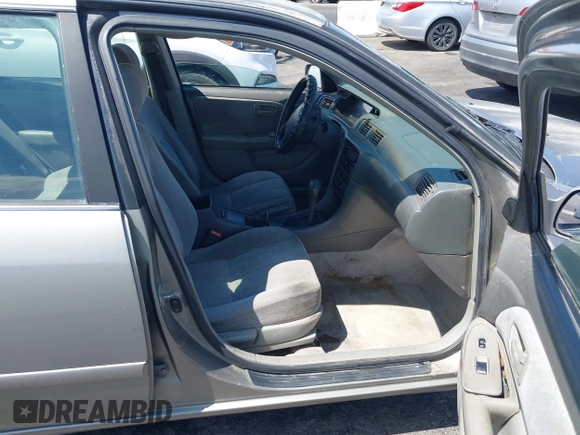 2000 Toyota Camry LE z VIN JT2BF22K4Y0286019, wystawiony jako IAAI lot #42083096 z przebiegiem 191 195 mil mil oraz . Historia ofert i sprzedaży dostępna na DreamBid. Obrazek 5.