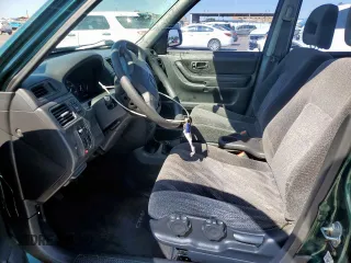 1999 Honda CR-V LX with VIN JHLRD174XXC045114, listed as a Copart auction lot 53889575 with 192,879 mi miles and Salvage Title. Bid and sale history available at carsss.com. Image 7.