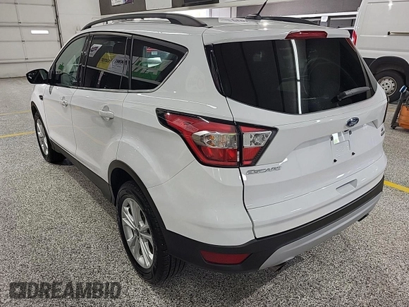2018 Ford Escape SE z VIN 1FMCU9GD4JUA76194, wystawiony jako IAAI lot #42421138 z przebiegiem 47 896 mil mil oraz . Historia ofert i sprzedaży dostępna na DreamBid. Obrazek 22.
