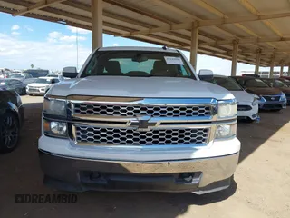 2015 Chevrolet Silverado 1500 LT with VIN 1GCVKREC1FZ415386, listed as a IAAI auction lot 42142990 with 165,409 mi miles and . Bid and sale history available at DreamBid. Image 12.