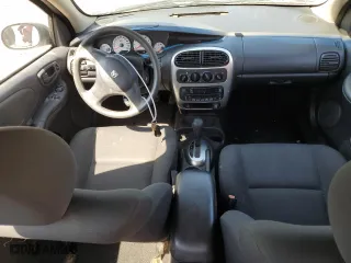 2005 Dodge Neon SXT with VIN 1B3ES56C55D195402, listed as a Copart auction lot 71735184 with 172,160 mi miles and Salvage Title. Bid and sale history available at carsss.com. Image 8.