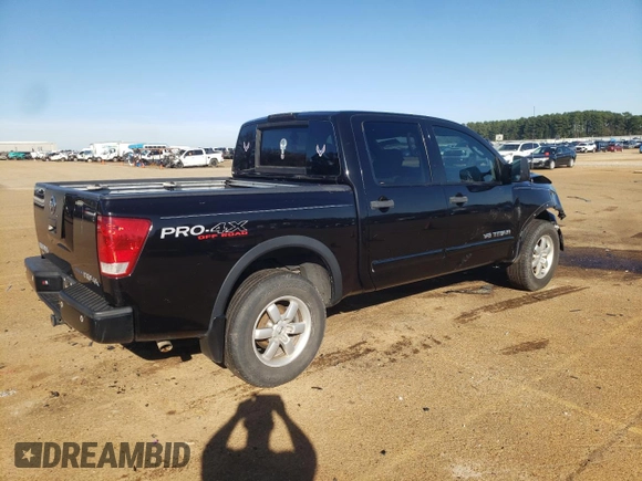 2011 Nissan Titan Pro-4X с VIN 1N6BA0ECXBN300561, выставлен на аукционе Copart как лот 85480484 с пробегом 158 547 миль миль и Списание • Salvage title. История ставок и продаж доступна на DreamBid. Изображение 3.