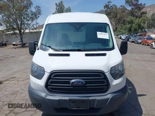2017 Ford Transit Cargo z VIN 1FTYE1CM9HKB50925, wystawiony jako IAAI lot #42095471 z przebiegiem 152 583 mil mil oraz . Historia ofert i sprzedaży dostępna na DreamBid. Obrazek 12.