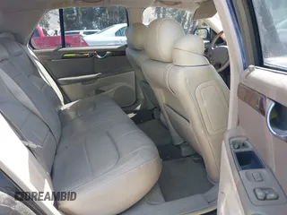 2002 Cadillac DeVille DTS z VIN 1G6KF579X2U134554, wystawiony jako IAAI lot #42244304 z przebiegiem 149 141 mil mil oraz . Historia ofert i sprzedaży dostępna na DreamBid. Obrazek 8.