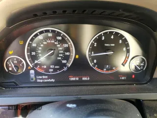 2009 BMW 7 Series 750i with VIN WBAKA83559CY33152, listed as a Copart auction lot 83770114 with 126,610 mi miles and Salvage title. Bid and sale history available at DreamBid. Image 9.
