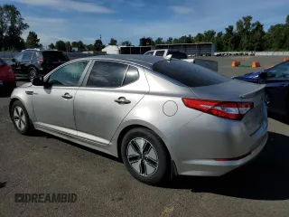 2013 Kia Optima Hybrid LX with VIN KNAGM4AD3D5051901, listed as a Copart auction lot 71238574 with 130,768 mi miles and Salvage Title. Bid and sale history available at carsss.com. Image 2.