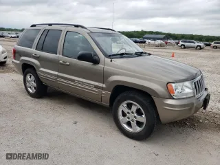 2004 Jeep Grand Cherokee Limited with VIN 1J8GW58N04C417707, listed as a Copart auction lot 53807104 with 185,966 mi miles and Salvage Title. Bid and sale history available at carsss.com. Image 4.
