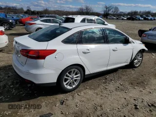 2015 Ford Focus SE with VIN 1FADP3F23FL217384, listed as a Copart auction lot 46570275 with 107,720 mi miles and Salvage Title. Bid and sale history available at carsss.com. Image 3.