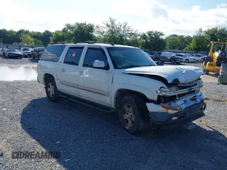 2005 Chevrolet Suburban LS z VIN 3GNEC16Z05G125924, wystawiony jako IAAI lot #42241502 z przebiegiem 204 435 mil mil oraz . Historia ofert i sprzedaży dostępna na DreamBid. Obrazek 1.