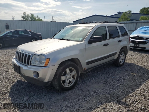 2005 Jeep Grand Cherokee Laredo with VIN 1J4GR48KX5C565762, listed as a Copart auction lot 63080115 with 122,349 mi miles and Salvage title. Bid and sale history available at DreamBid. Image 1.