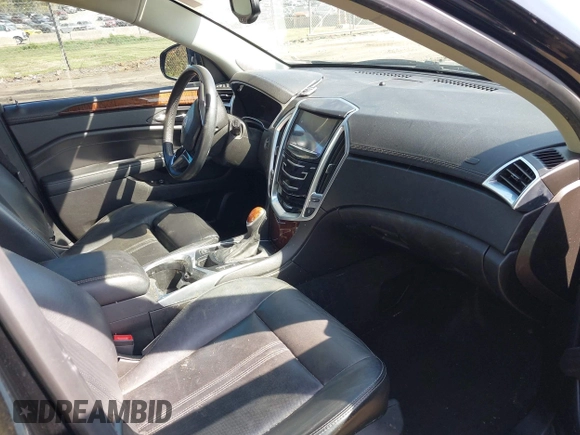 2016 Cadillac SRX Luxury Collection with VIN 3GYFNEE38GS533898, listed as a IAAI auction lot 41898772 with 187,101 mi miles. Bid and sale history available at carsss.com. Image 5.