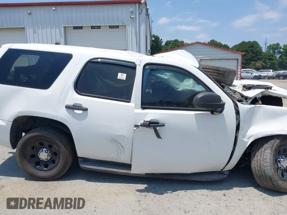 2013 Chevrolet Tahoe Commercial with VIN 1GNLC2E08DR216213, listed as a IAAI auction lot 37406061 with Not provided miles and . Bid and sale history available at DreamBid. Image 13.
